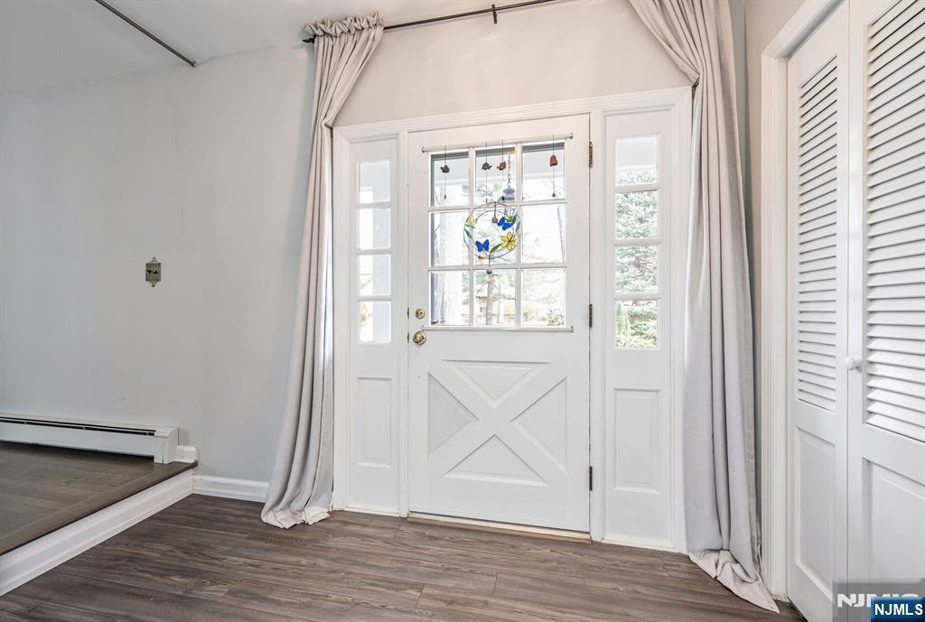 44 Deerfield Terrace Mahwah, NJ 07430 - Photo 5 of 42 a view of an entryway with wooden floor