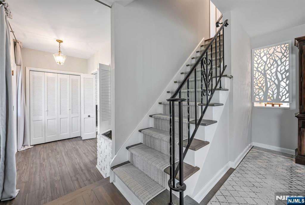 44 Deerfield Terrace Mahwah, NJ 07430 - Photo 6 of 42 a view of entryway with wooden floor and stairs
