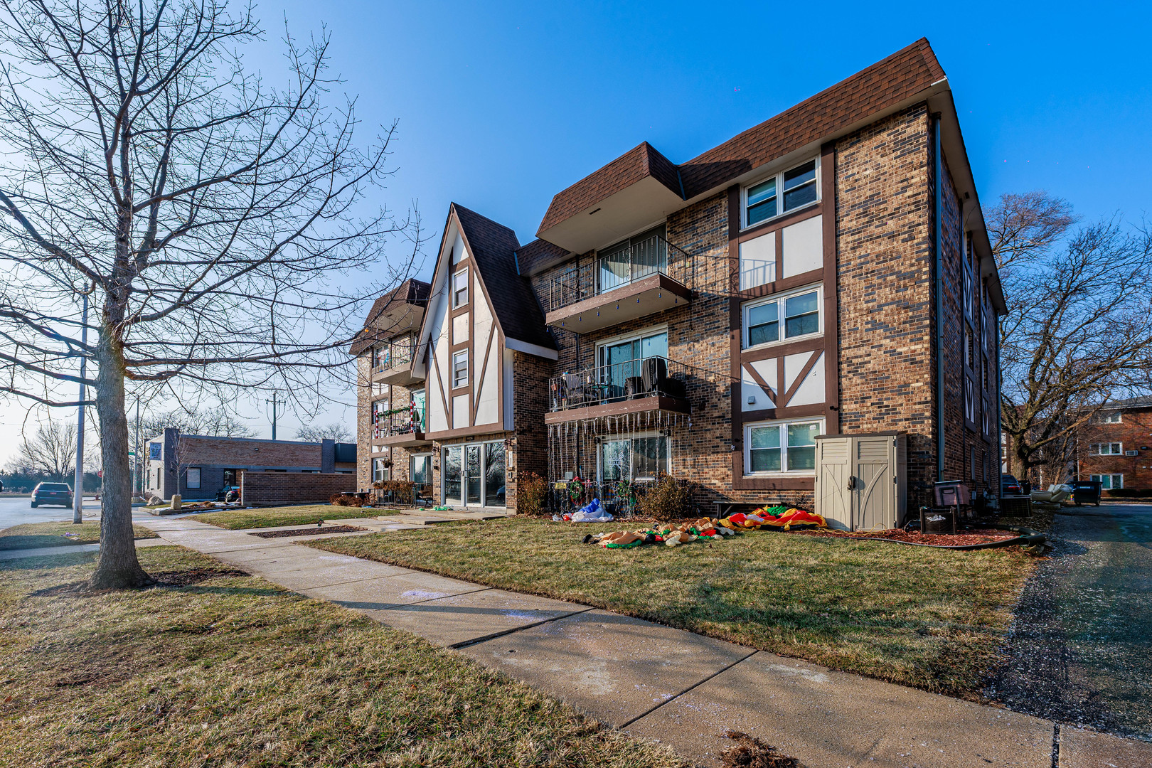 11036 Kilpatrick Avenue, Unit 3SW Oak Lawn, IL 60453 - Photo 19 of 19 a street sign on a sidewalk next to a road