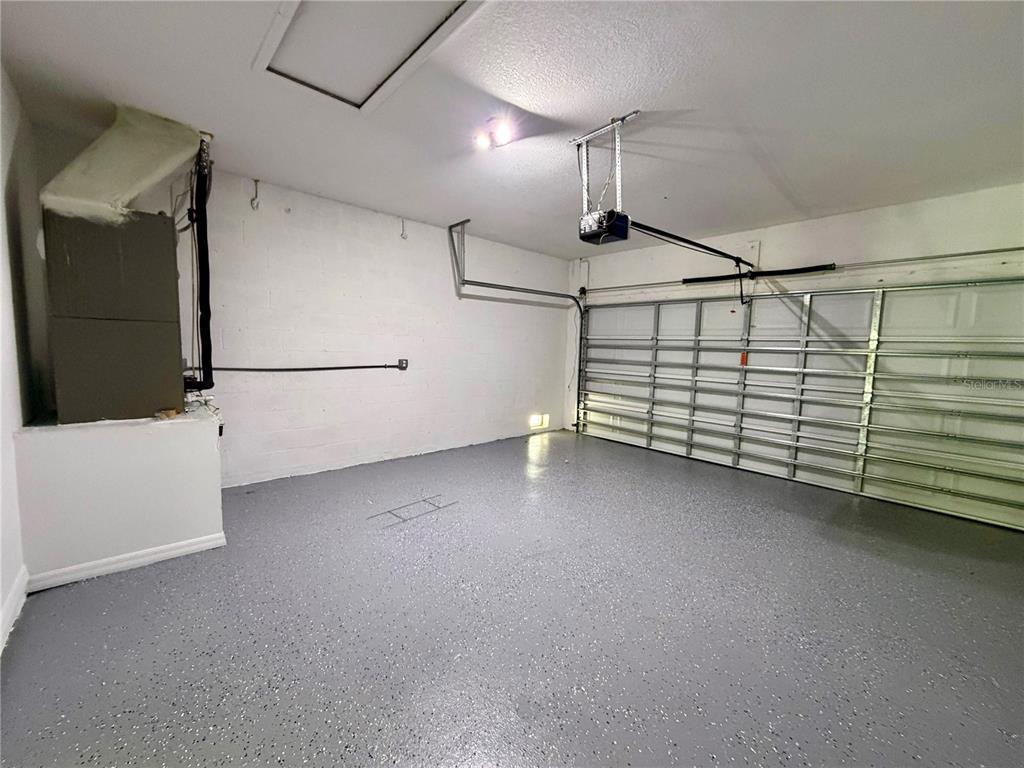 14142 Appleton Boulevard Port Charlotte, FL 33981 - Photo 23 of 26 a view of a garage
