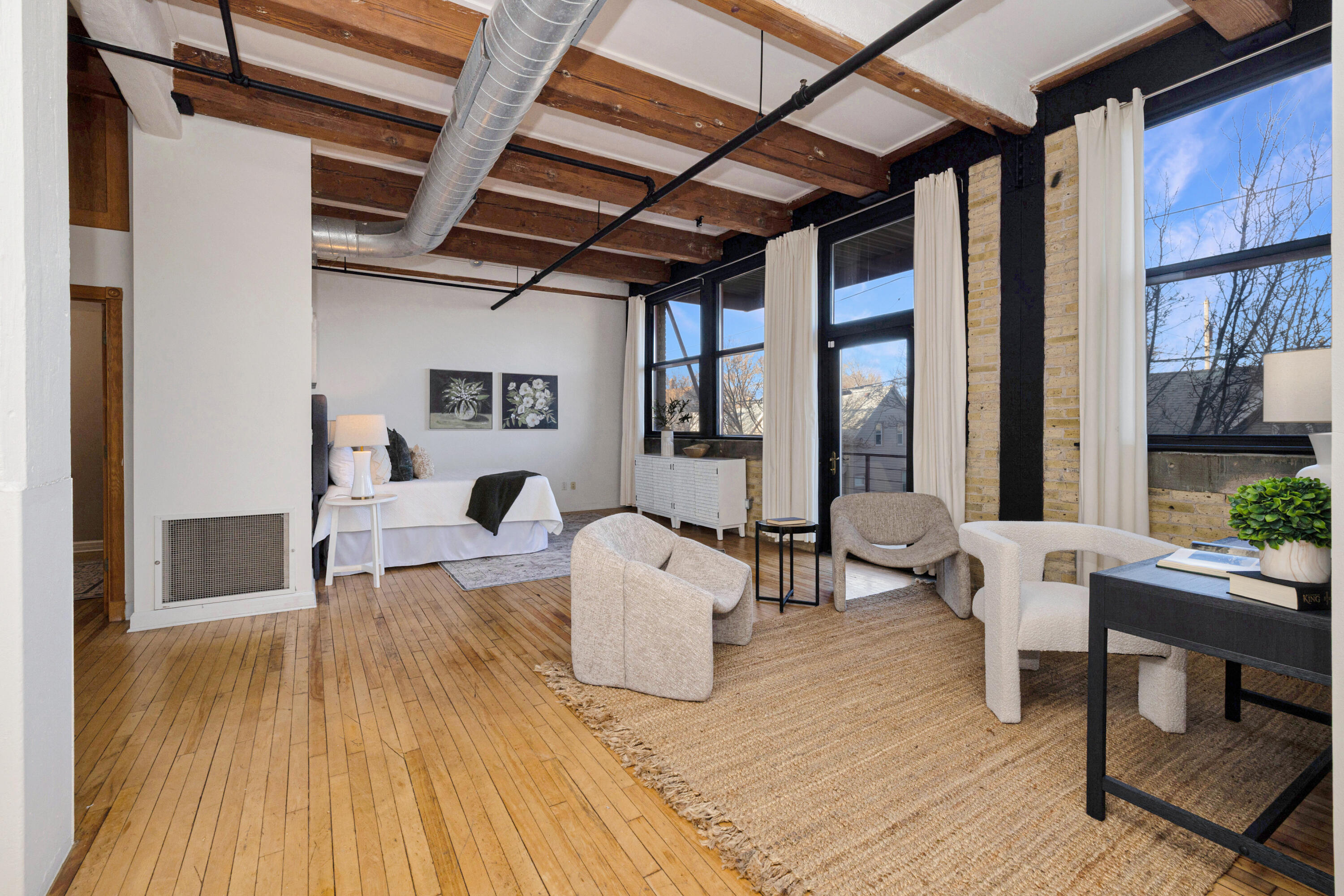 215 West Maple Street, Unit 105 Milwaukee, WI 53204 - Photo 11 of 33 Large open bedroom and space to split off a separate room (adding walls or room divider)