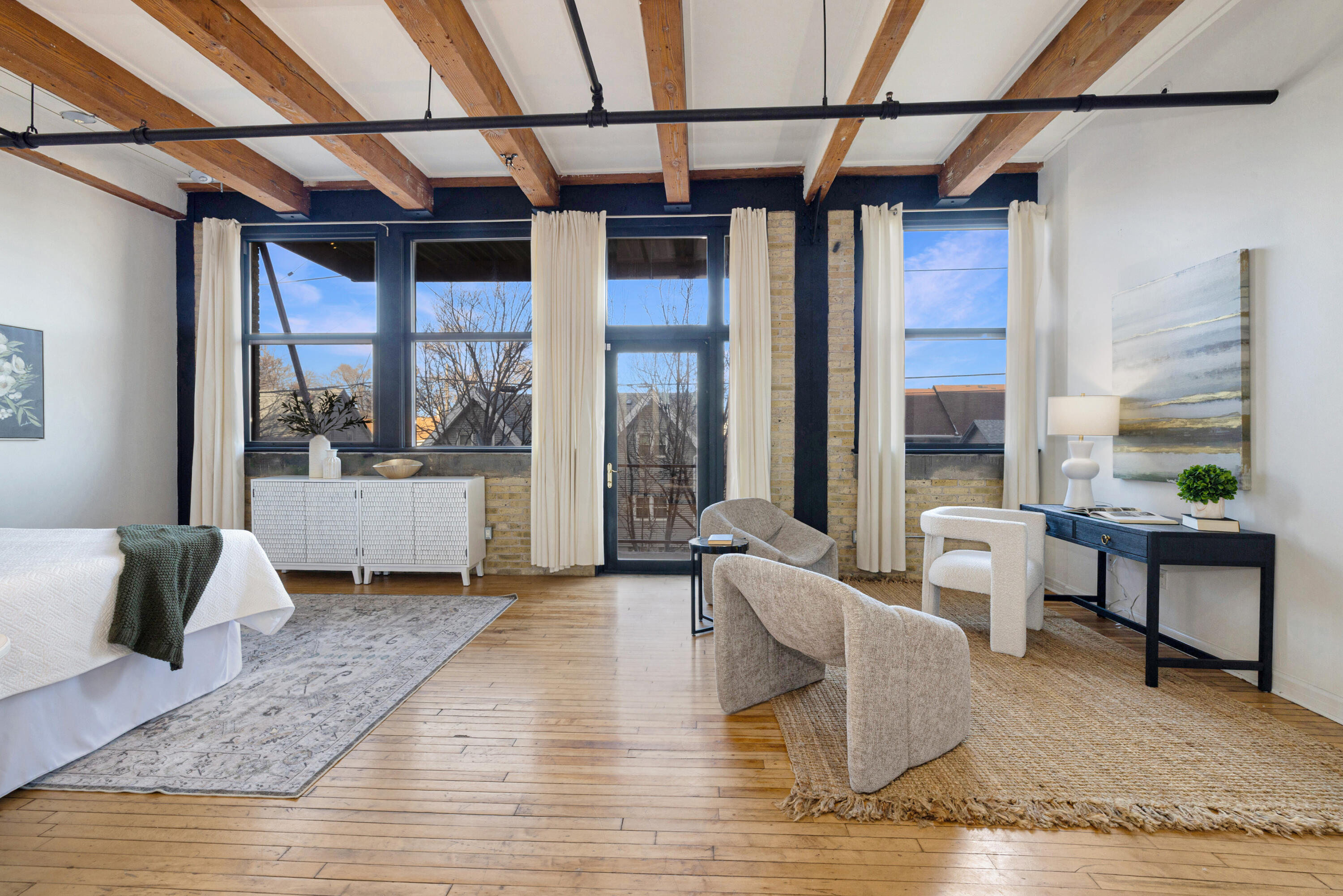 215 West Maple Street, Unit 105 Milwaukee, WI 53204 - Photo 12 of 33 Bedroom and office/lounge area, could also be a workout space, nursery, etc