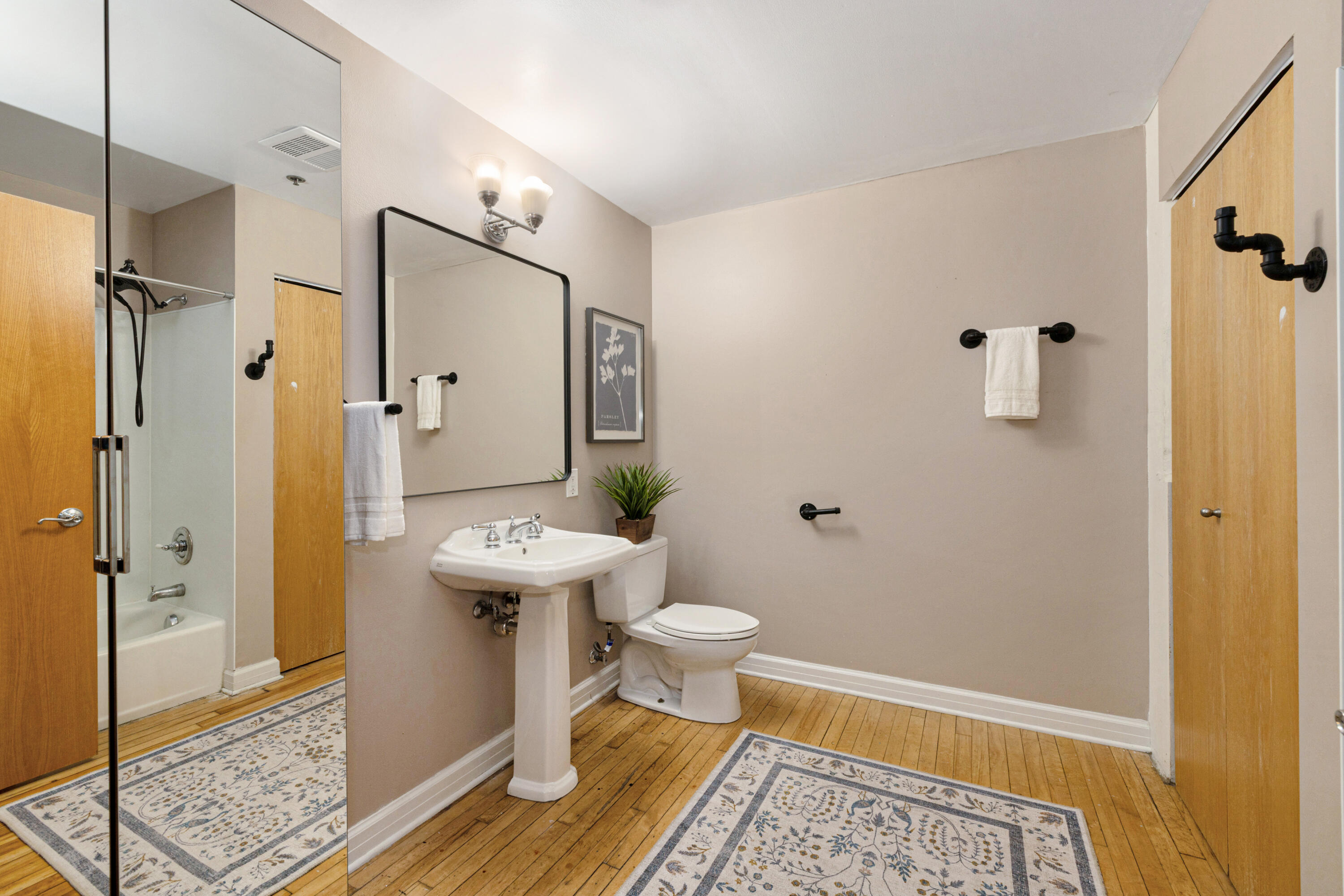 215 West Maple Street, Unit 105 Milwaukee, WI 53204 - Photo 15 of 33 Full bath with storage and laundry