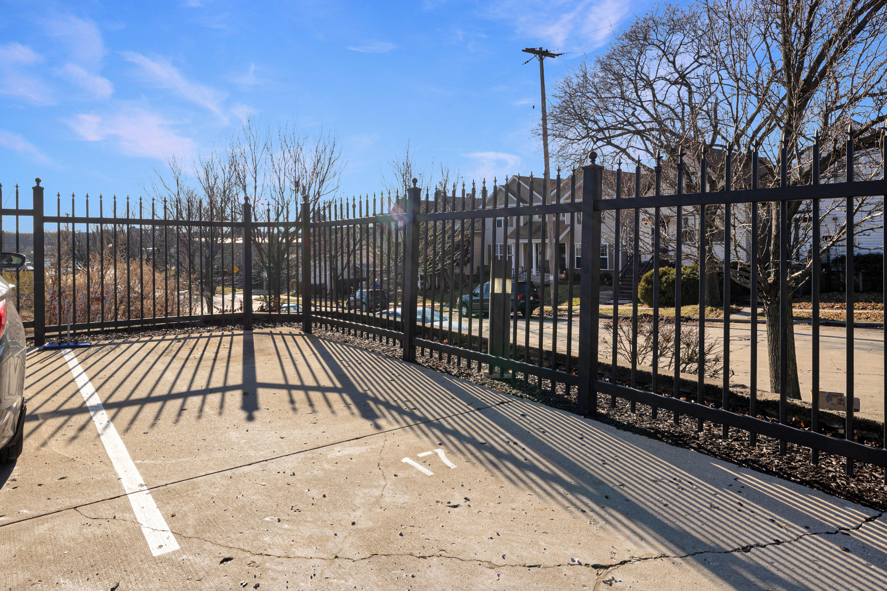 215 West Maple Street, Unit 105 Milwaukee, WI 53204 - Photo 22 of 33 Assigned spot inside fully gated lot