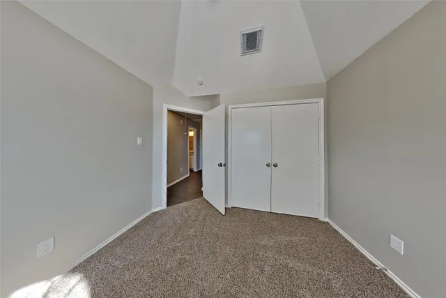 a view of a room with an empty space