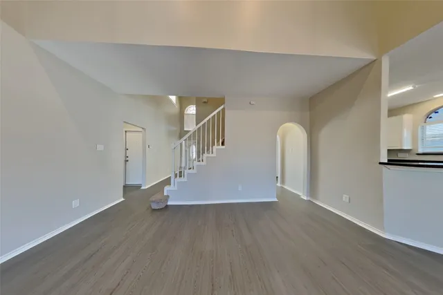 a view of entryway with wooden floor