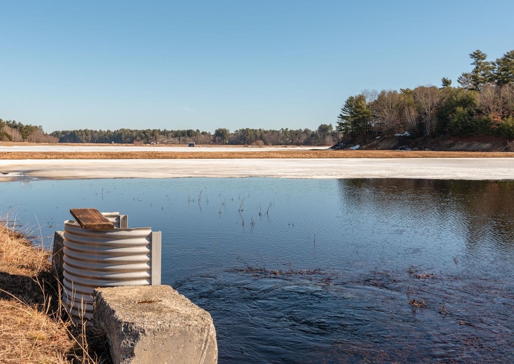 210 Bay Road Norton, MA 02766 - Photo 22 of 24 a view of a room that has a bed and a chair