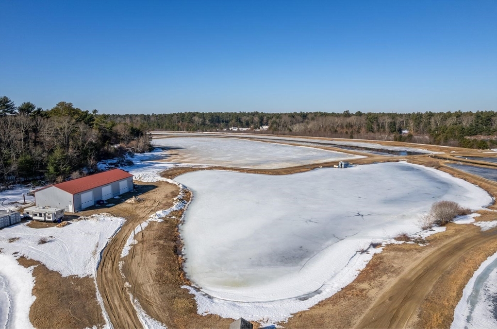 210 Bay Road Norton, MA 02766 - Photo 7 of 24 a view of a swimming pool and an ocean