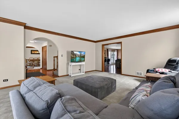 a living room with furniture and window