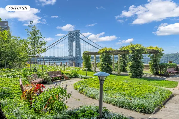 a view of outdoor space with garden and deck