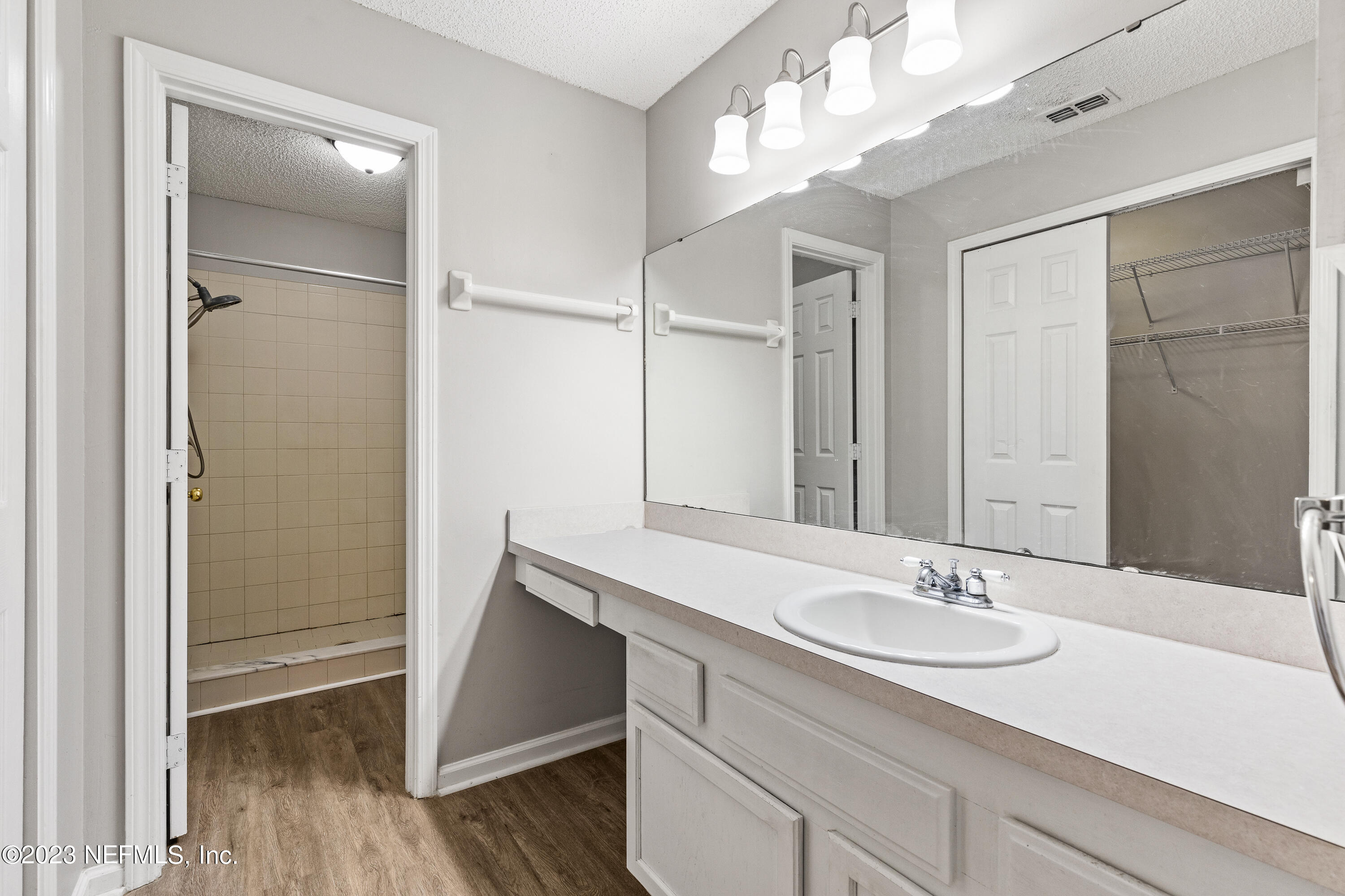 13240 Pacemaker Drive Jacksonville, FL 32225 - Photo 13 of 21 a bathroom with a sink double vanity and a mirror