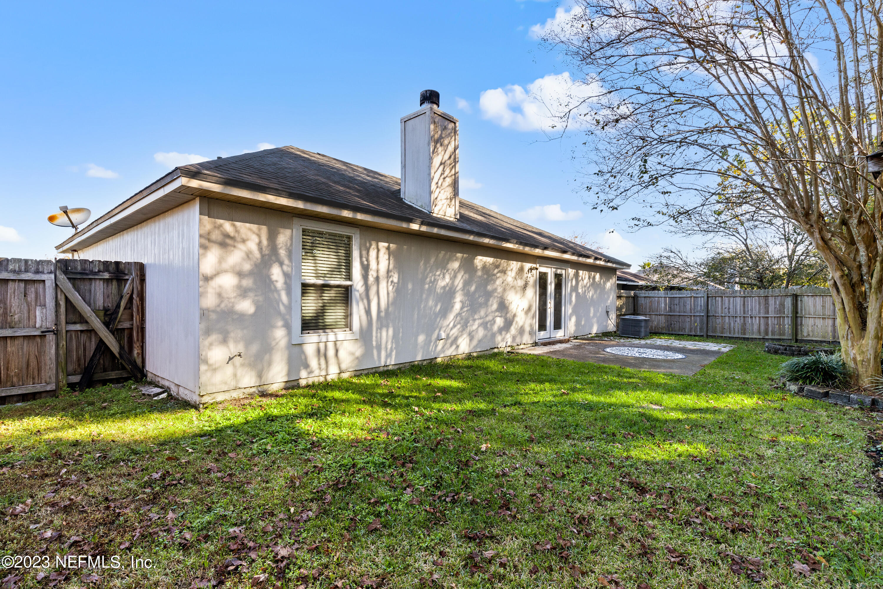 13240 Pacemaker Drive Jacksonville, FL 32225 - Photo 19 of 21 a view of a house with backyard