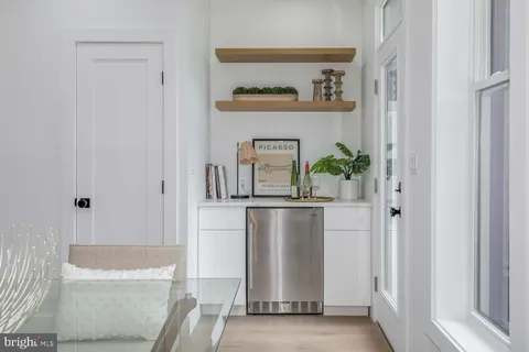 a large kitchen with kitchen island granite countertop lots of counter top space