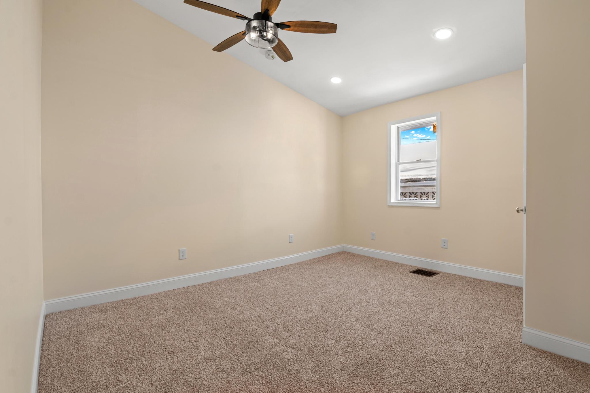 315 Riverside Drive Essex, MD 21221 - Photo 18 of 33 an empty room with windows