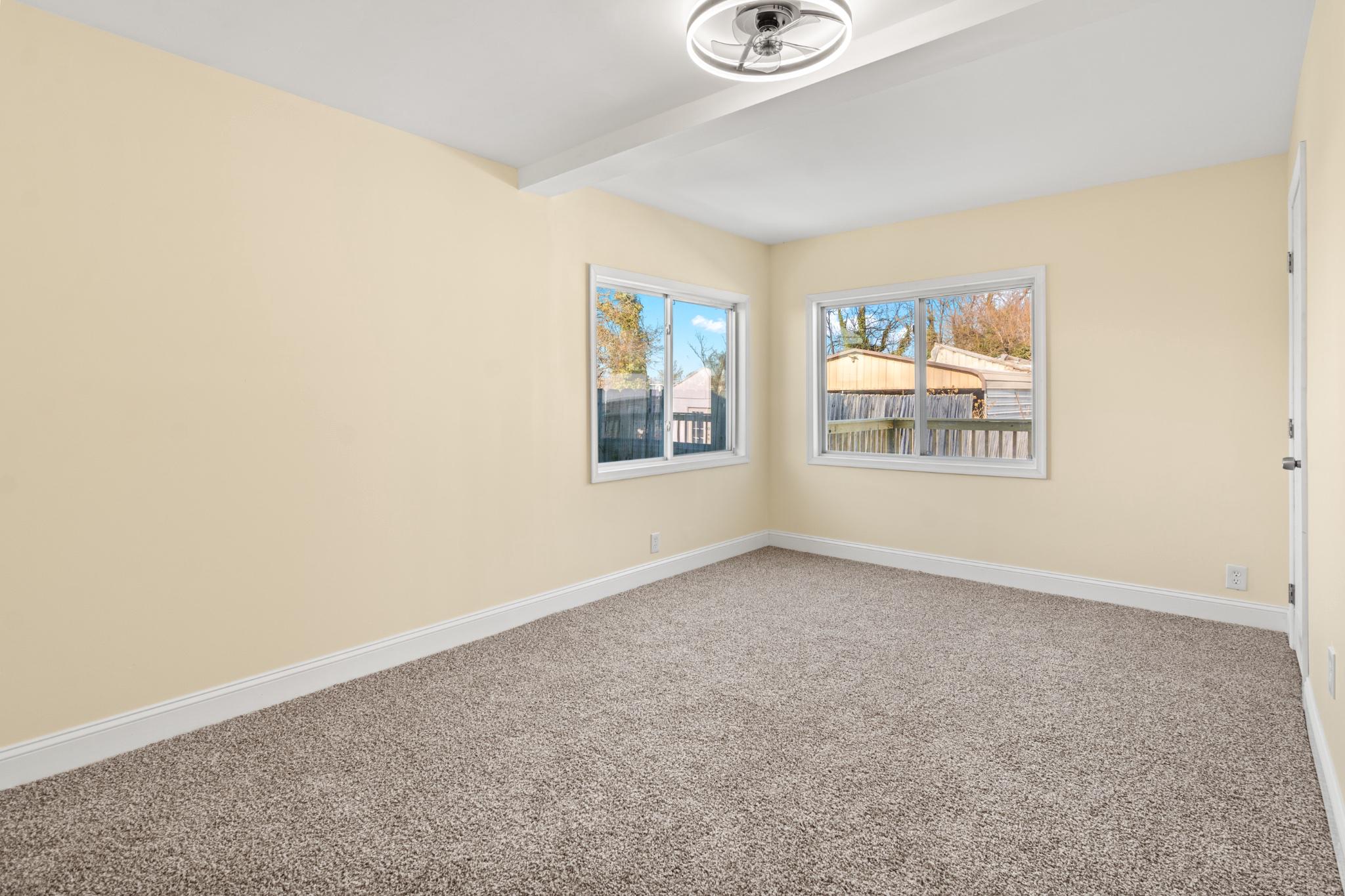 315 Riverside Drive Essex, MD 21221 - Photo 26 of 33 an empty room with windows and closet