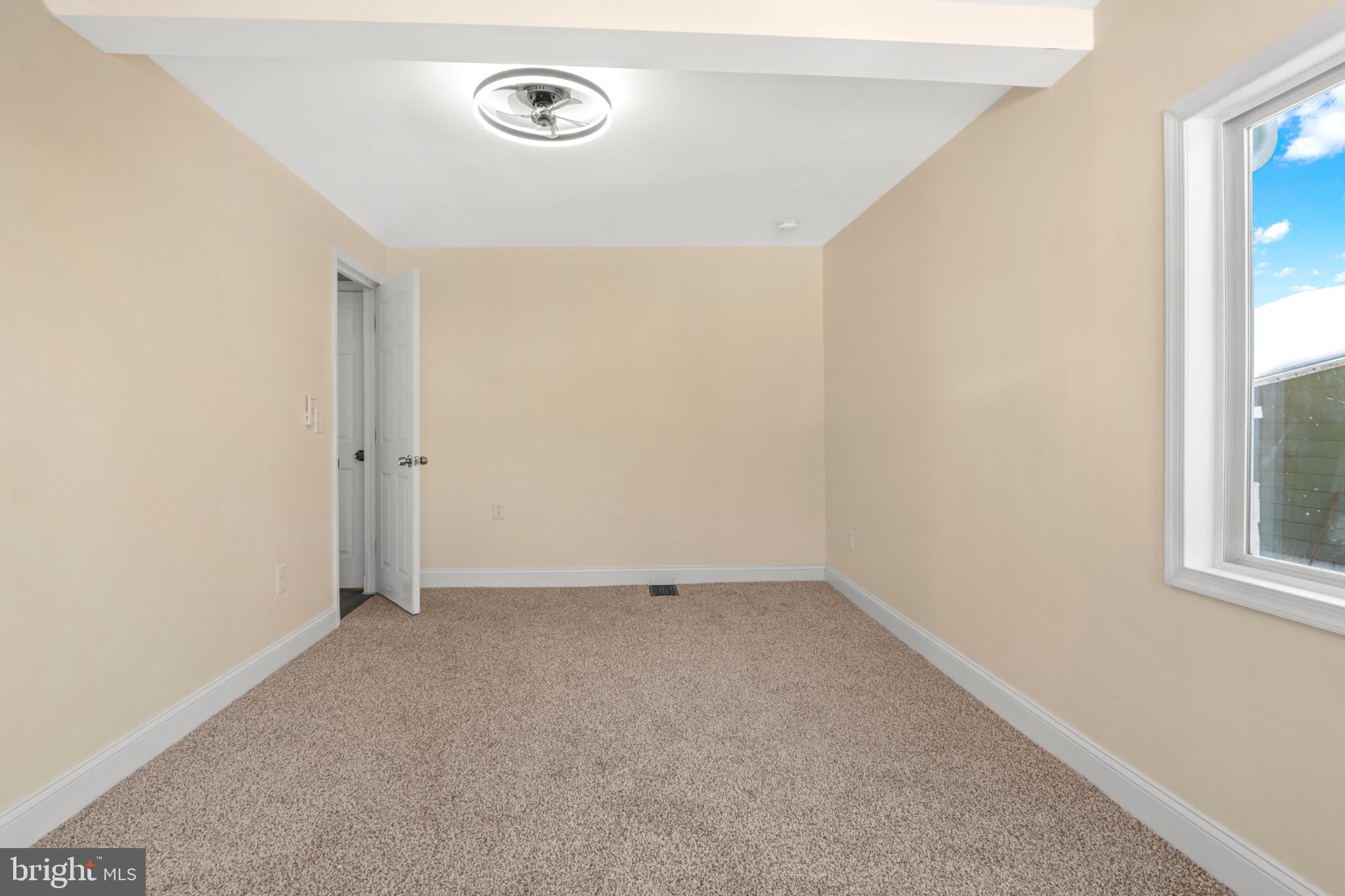 315 Riverside Drive Essex, MD 21221 - Photo 27 of 33 an empty room with windows