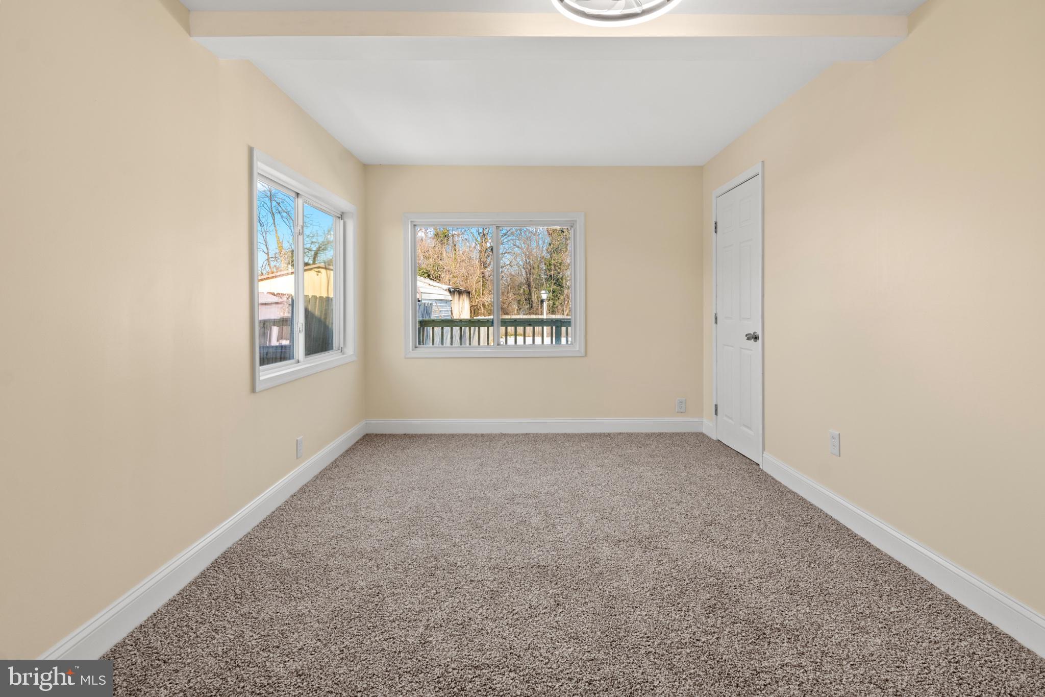 315 Riverside Drive Essex, MD 21221 - Photo 28 of 33 an empty room with windows