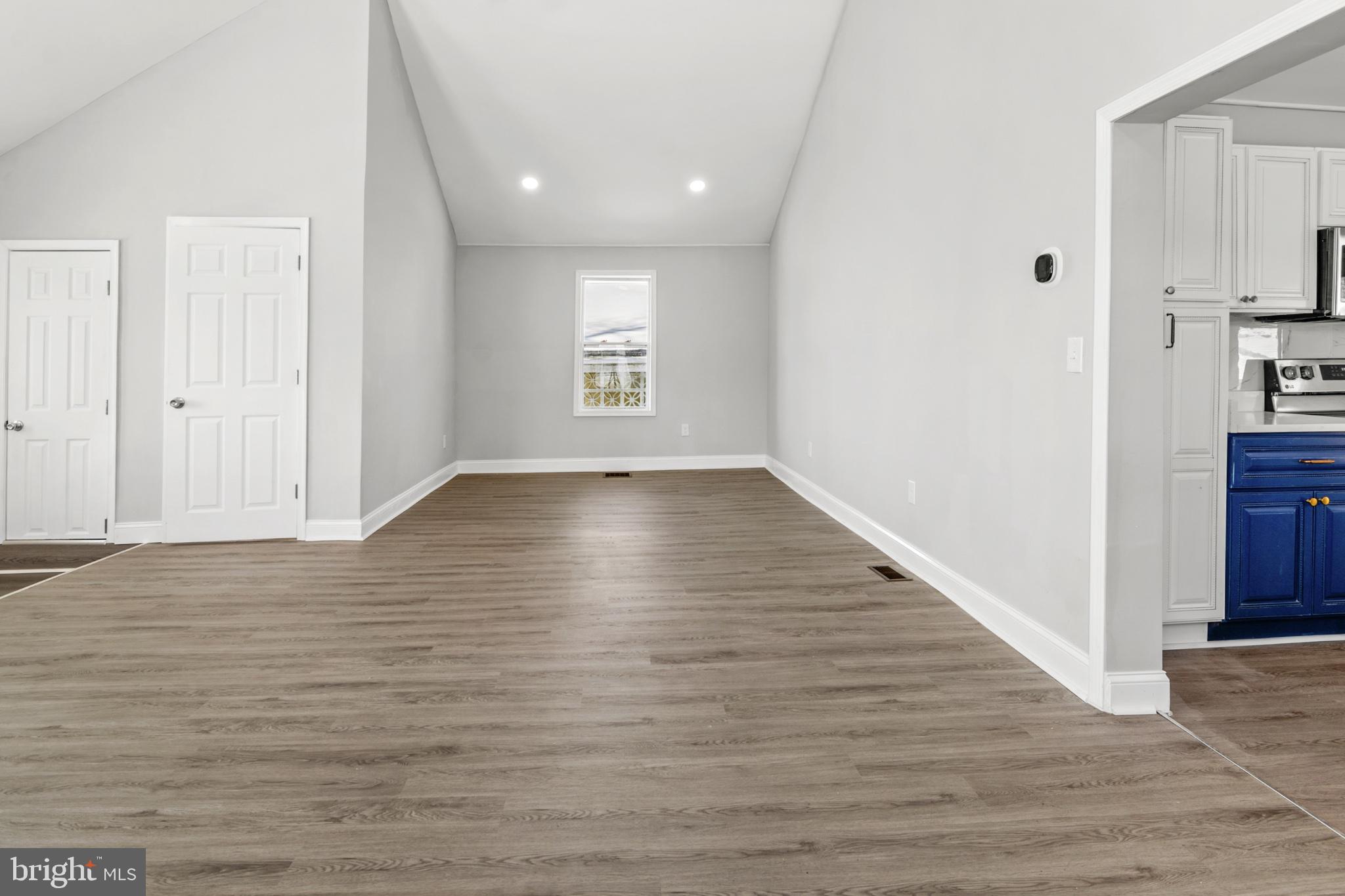315 Riverside Drive Essex, MD 21221 - Photo 9 of 33 a view of a livingroom with wooden floor