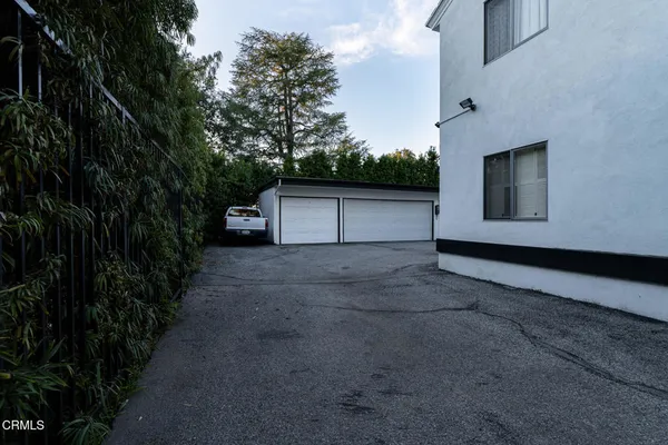 a house view with a backyard space