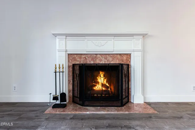 a living room with a fireplace
