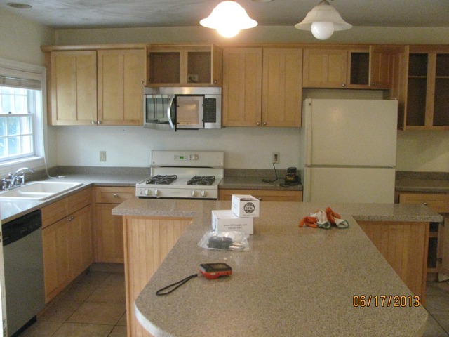 18324 Perth Avenue Homewood, IL 60430 - Photo 12 of 17 a kitchen with a sink appliances and cabinets