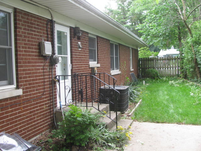 18324 Perth Avenue Homewood, IL 60430 - Photo 17 of 17 a house view with a garden space