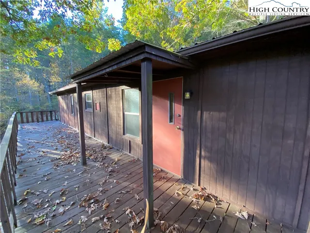 a backyard of a house with seating space