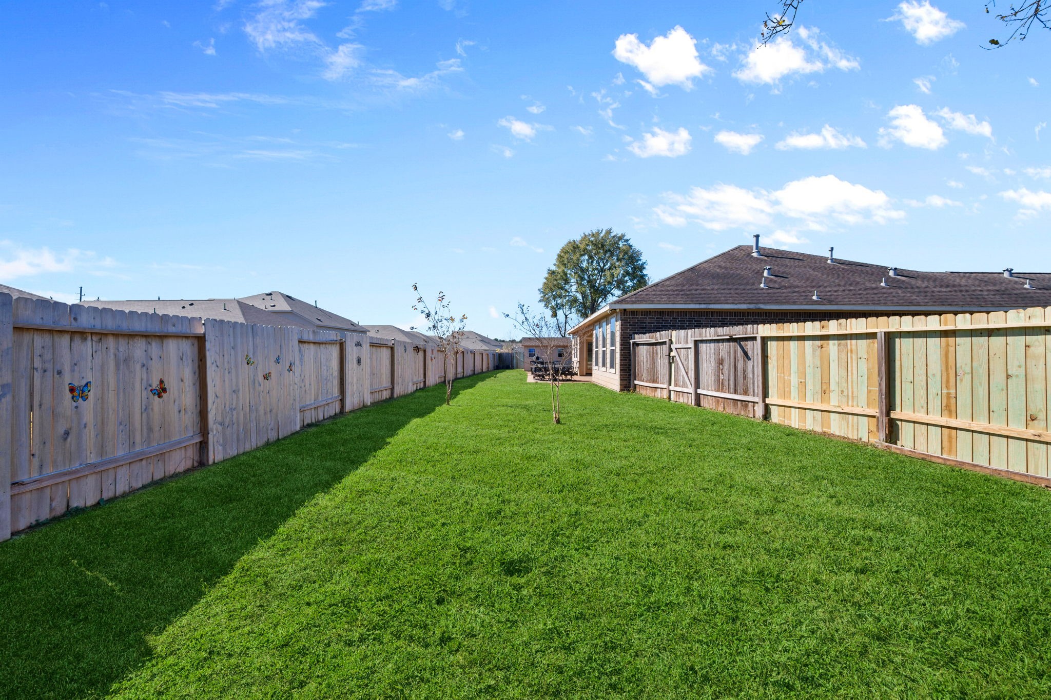 123 Noble View Court Magnolia, TX 77354 - Photo 25 of 29 a view of an house with backyard and garden