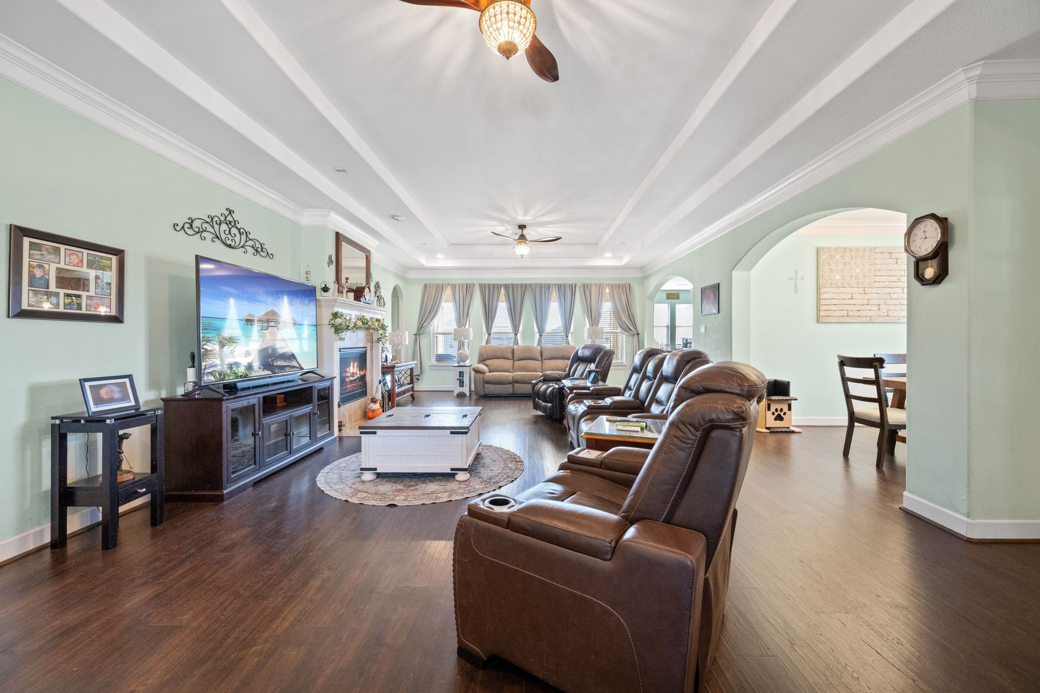 123 Noble View Court Magnolia, TX 77354 - Photo 7 of 29 a living room with furniture fireplace and wooden floor