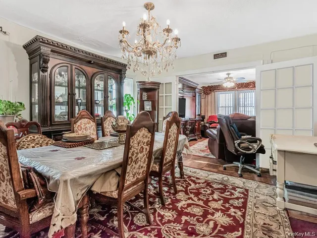 a view of a dining room with furniture