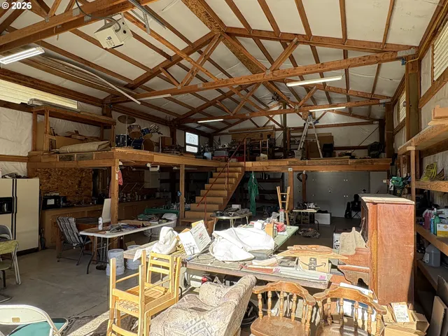 a view of a chairs and table in the patio