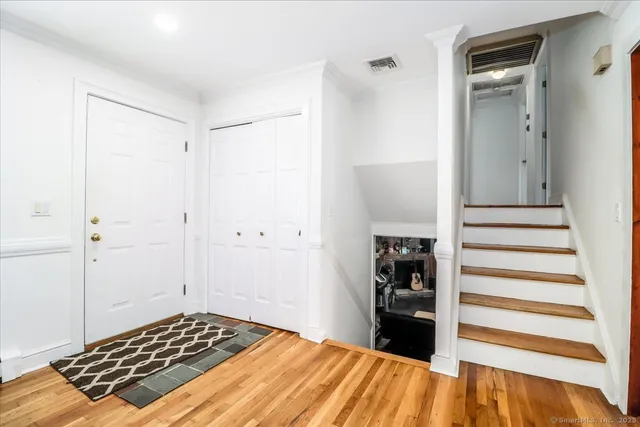 a bedroom with a bed and cabinets