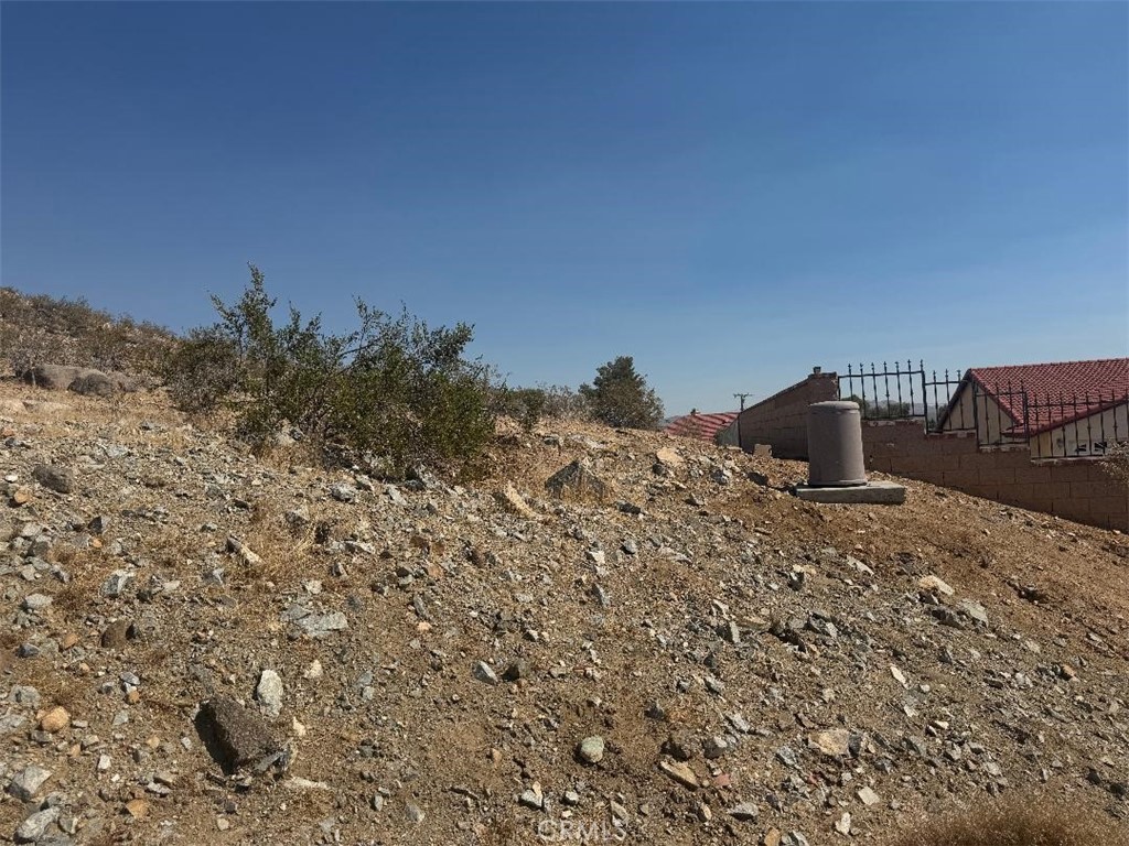 0 Plaina Road Apple Valley, CA 92307 - Photo 4 of 15 a backyard of a house with lots of green space