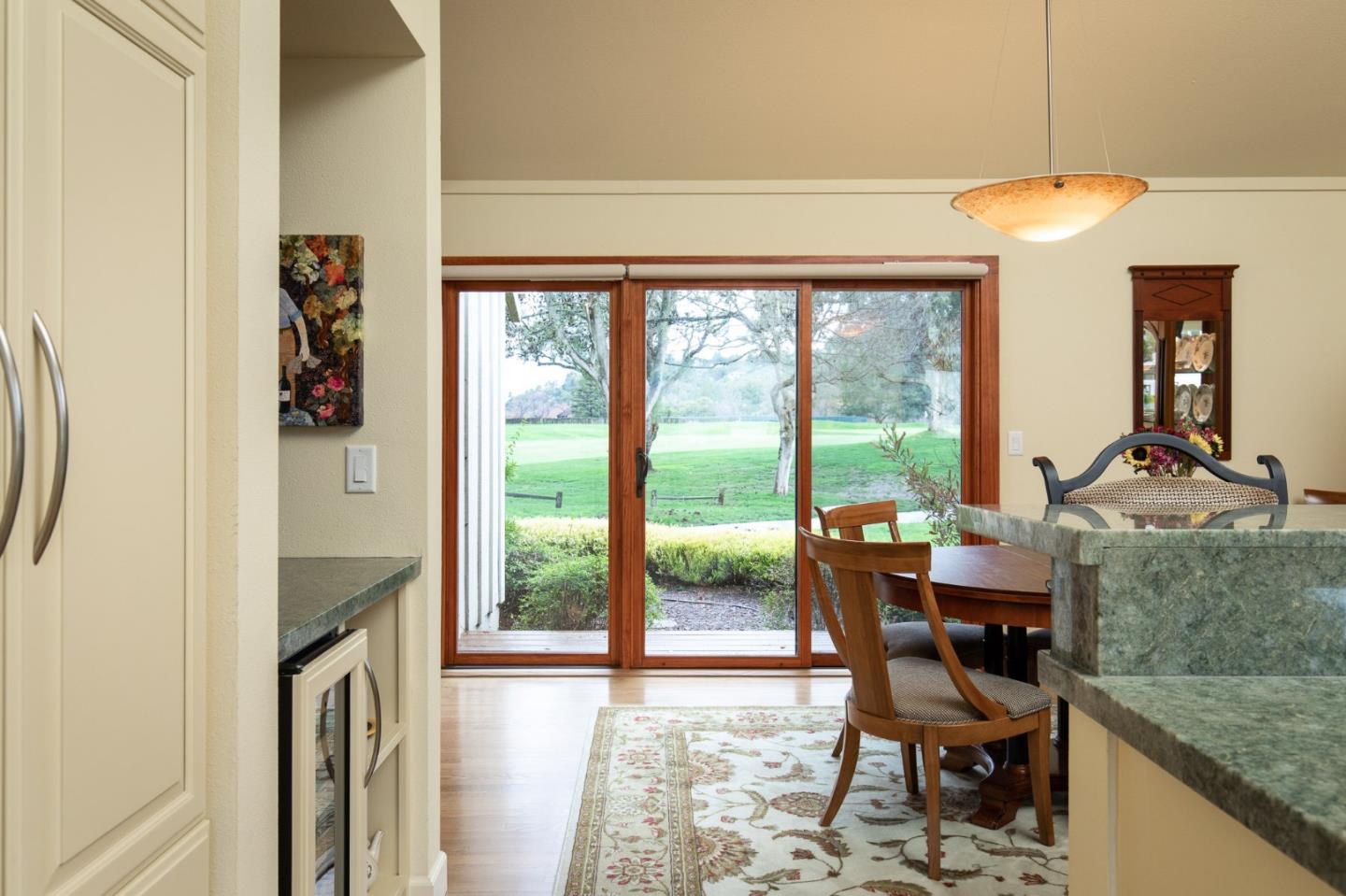 28056 Hawk Court Carmel, CA 93923 - Photo 11 of 22 a dining room with furniture and a floor to ceiling window