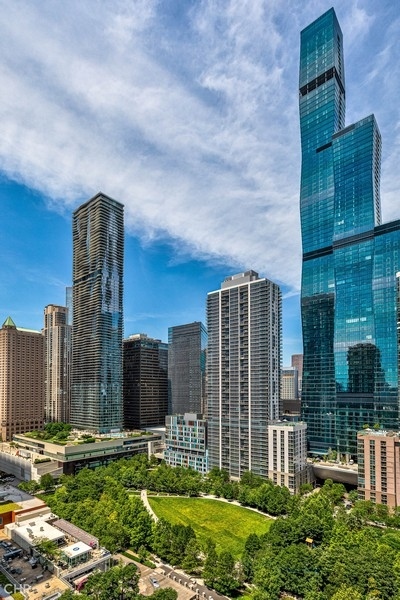 400 East Randolph Street, Unit 3429 Chicago, IL 60601 - Photo 11 of 44 a garden view with tall buildings