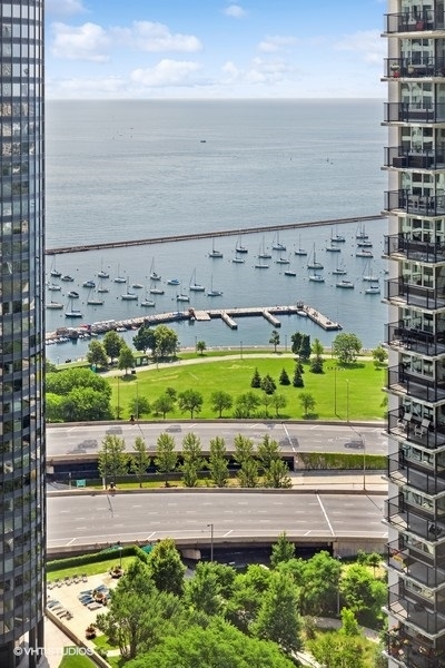 400 East Randolph Street, Unit 3429 Chicago, IL 60601 - Photo 19 of 44 a view of a with cars parked on the road