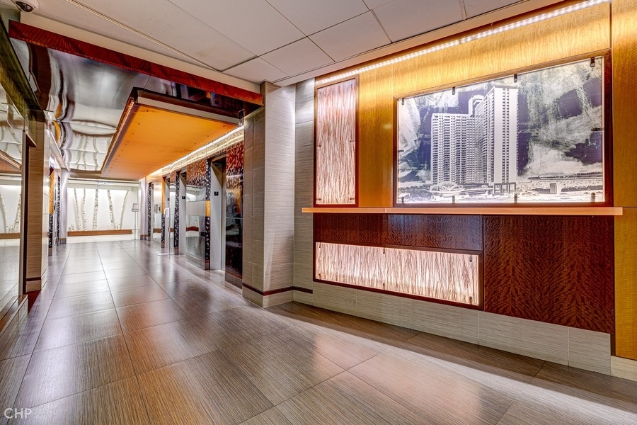 400 East Randolph Street, Unit 3429 Chicago, IL 60601 - Photo 31 of 44 a view of gallery with wooden floor