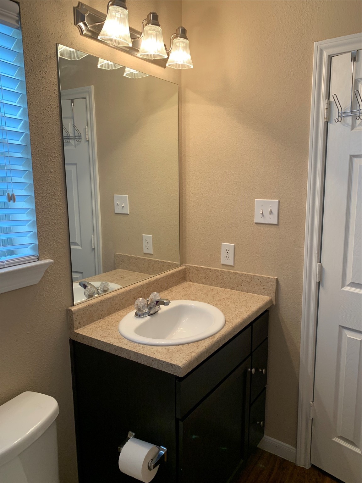17038 Wilthorne Gardens Court Houston, TX 77084 - Photo 19 of 25 a bathroom with a sink and a mirror