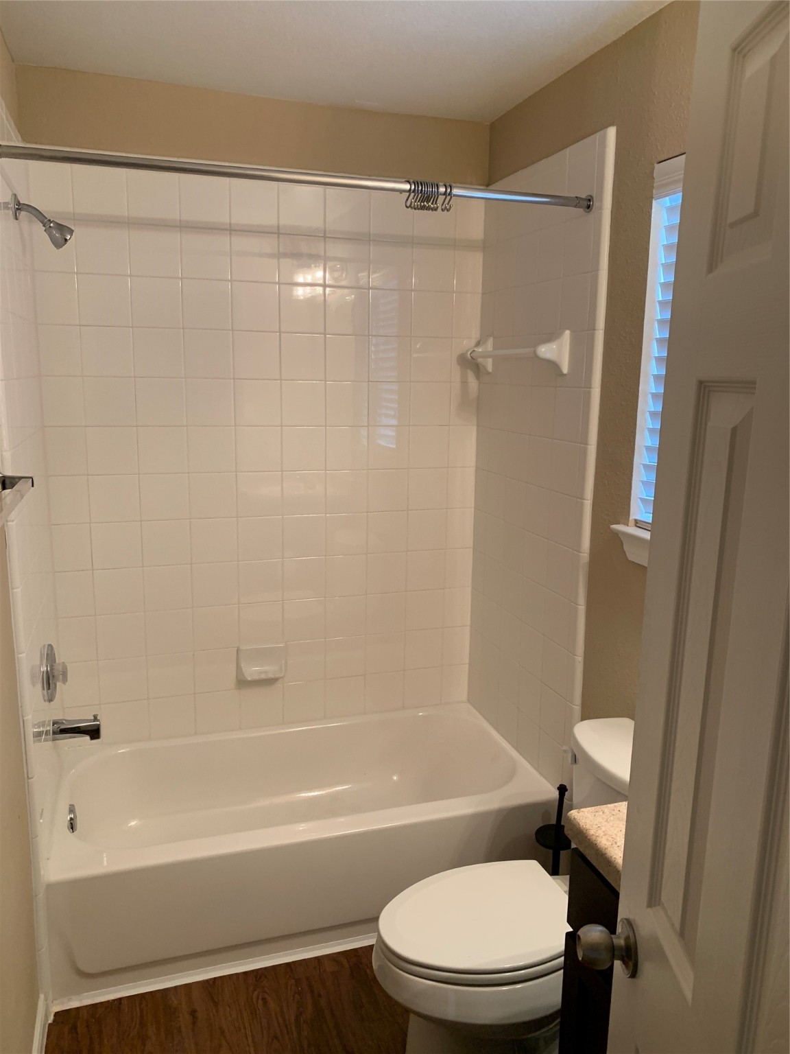17038 Wilthorne Gardens Court Houston, TX 77084 - Photo 20 of 25 a bathroom with a toilet and a bathtub