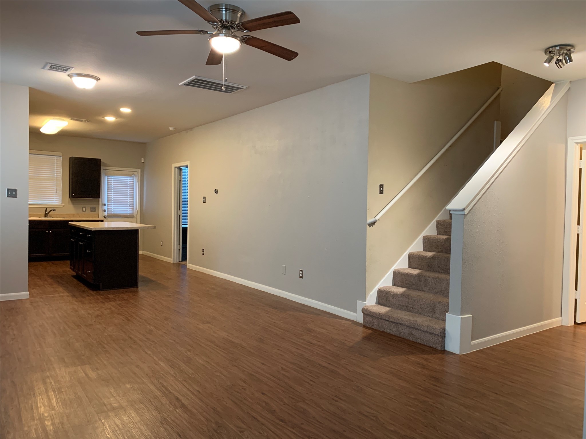 17038 Wilthorne Gardens Court Houston, TX 77084 - Photo 25 of 25 a view of kitchen and kitchen with furniture and a ceiling fan