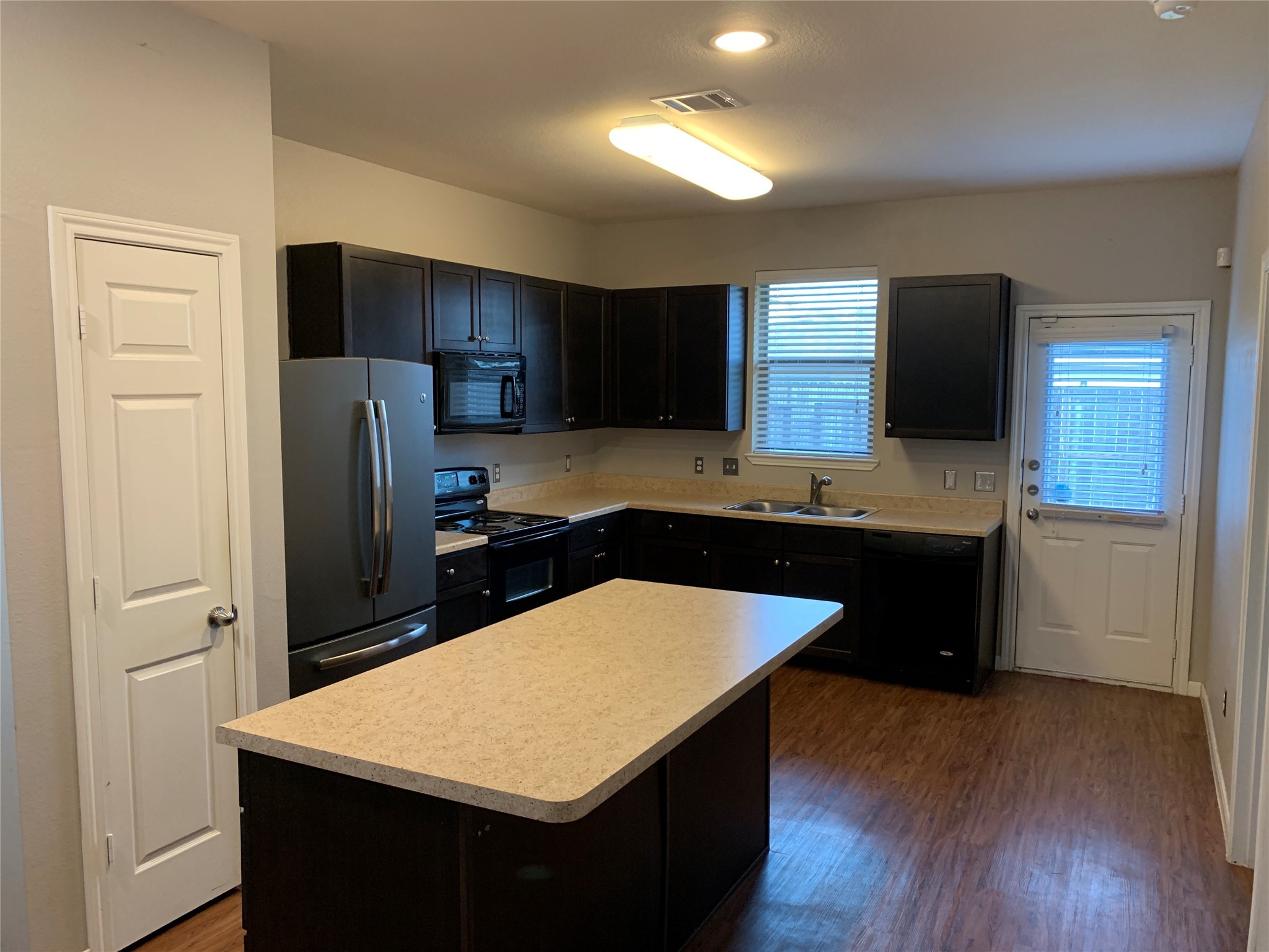 17038 Wilthorne Gardens Court Houston, TX 77084 - Photo 6 of 25 a kitchen with stainless steel appliances a refrigerator and a stove