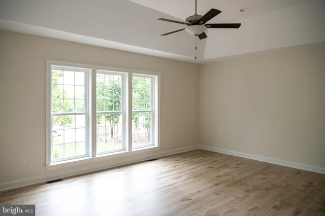 a bathroom with a sink vanity and mirror