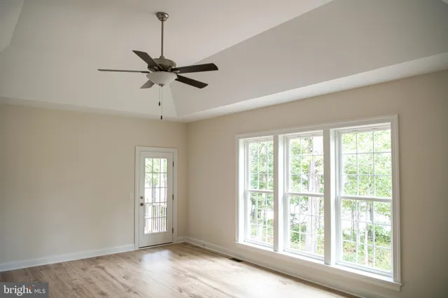 a bathroom with a sink vanity and mirror