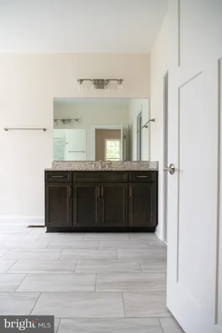 a view of a porch with wooden floor