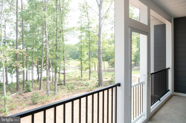 a view of house with backyard of the house
