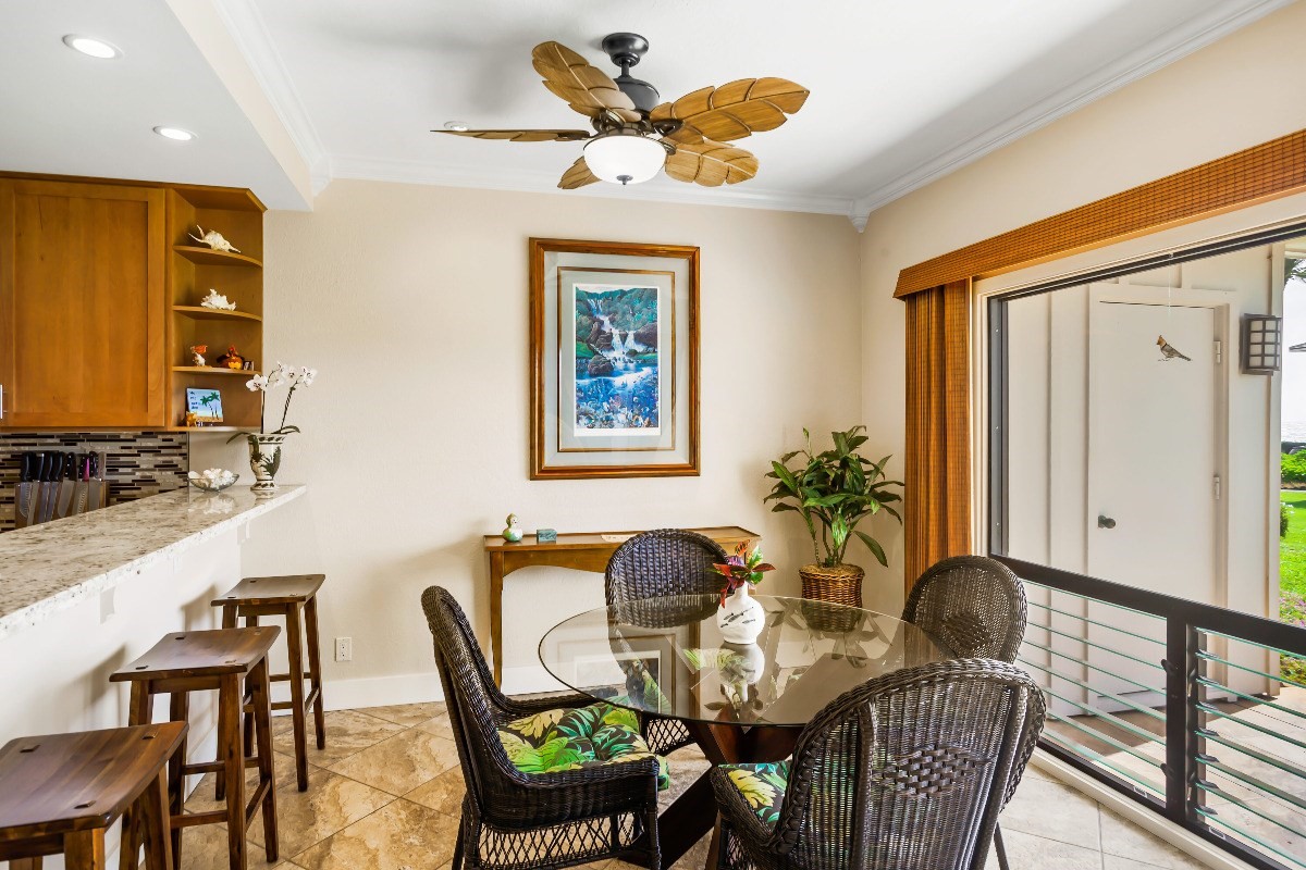 1565 Pe'e Road, Unit 415 Koloa, HI 96756 - Photo 7 of 18 a dining room with furniture and window