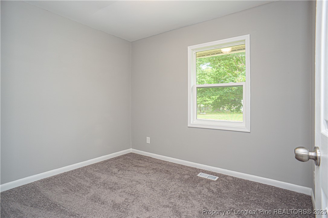 2701 Daly Avenue Spring Lake, NC 28390 - Photo 11 of 34 an empty room with a window