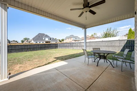 a house view with a outdoor space