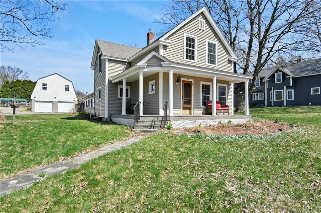 172 Old Turnpike Road Thompson, CT 06255 - Photo 1 of 1 a front view of a house with a yard and trees