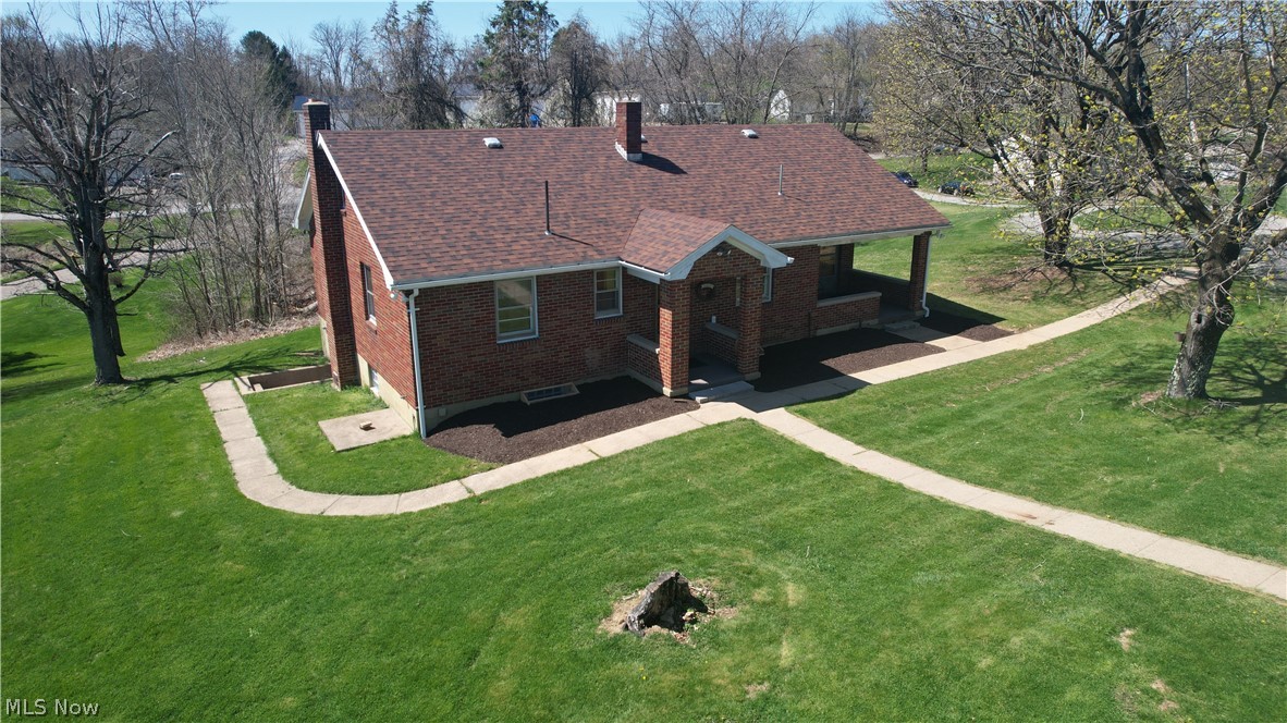 1772 Bantam Ridge Road Steubenville, OH 43953 - Photo 33 of 43 Rear view of house with a yard